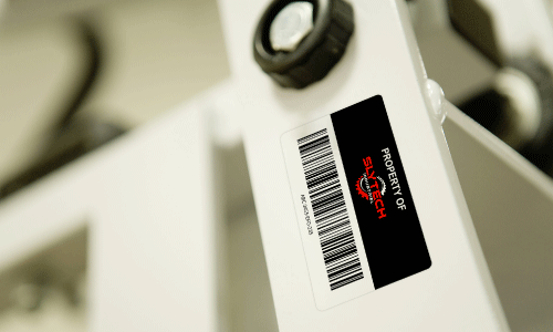 Custom OEM logo decal with barcode on piece of equipment